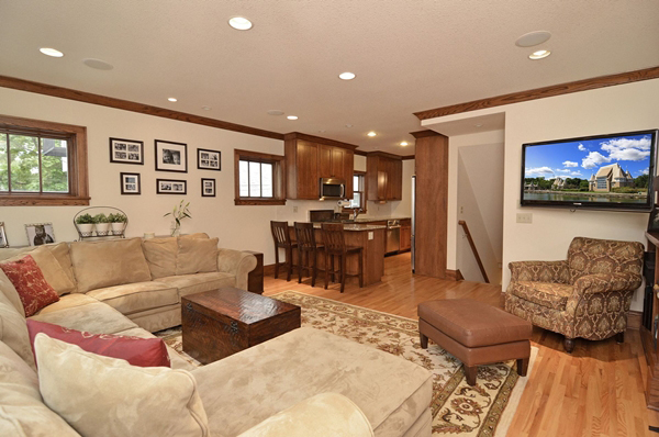 Family room with view into galley kitchen.