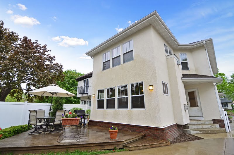 Rear exterior with deck and two-story addition.