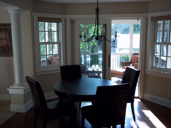 Dining nook with bright windows and trim detail.