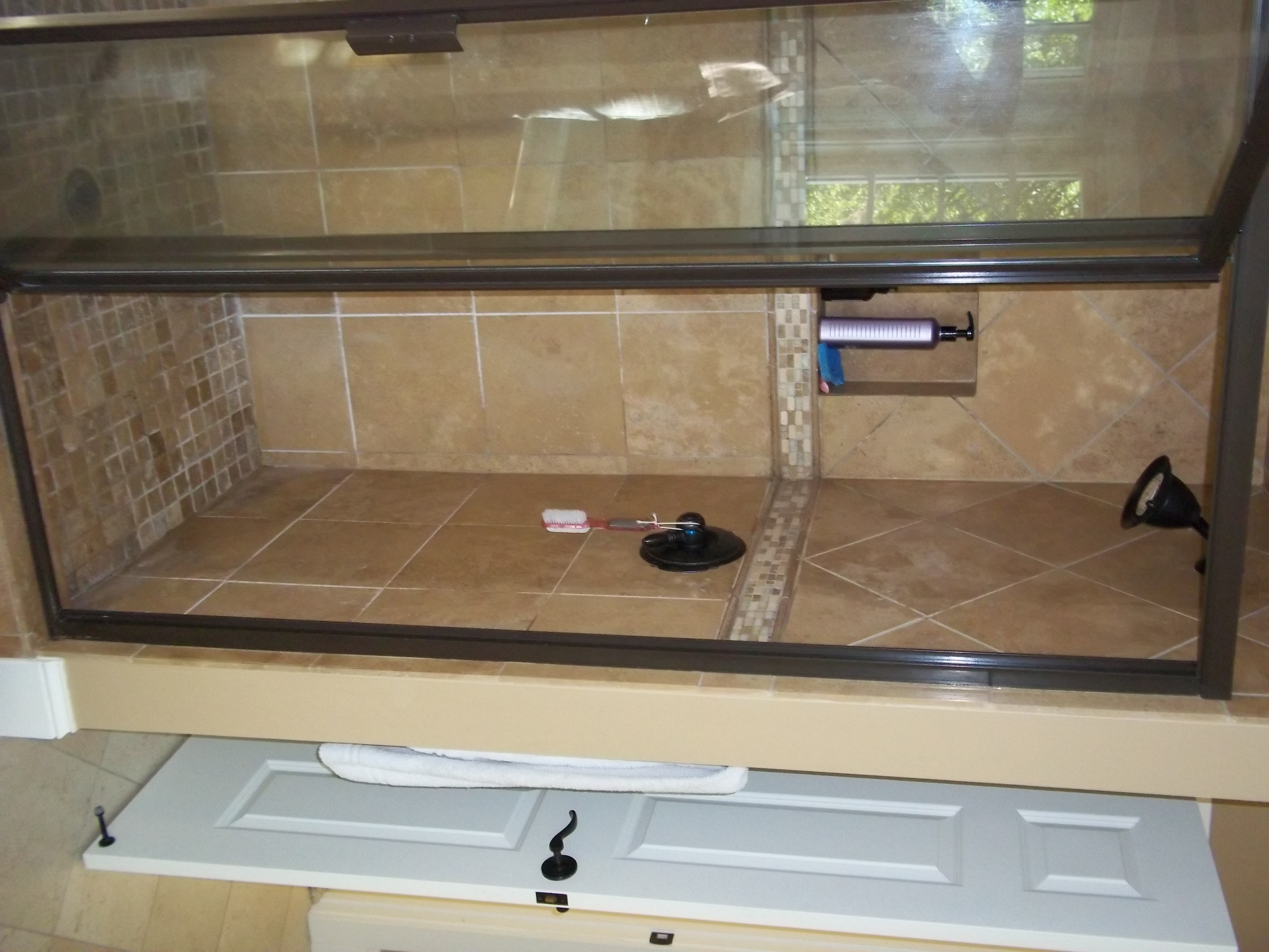 Screened porch seating area designed for comfort.