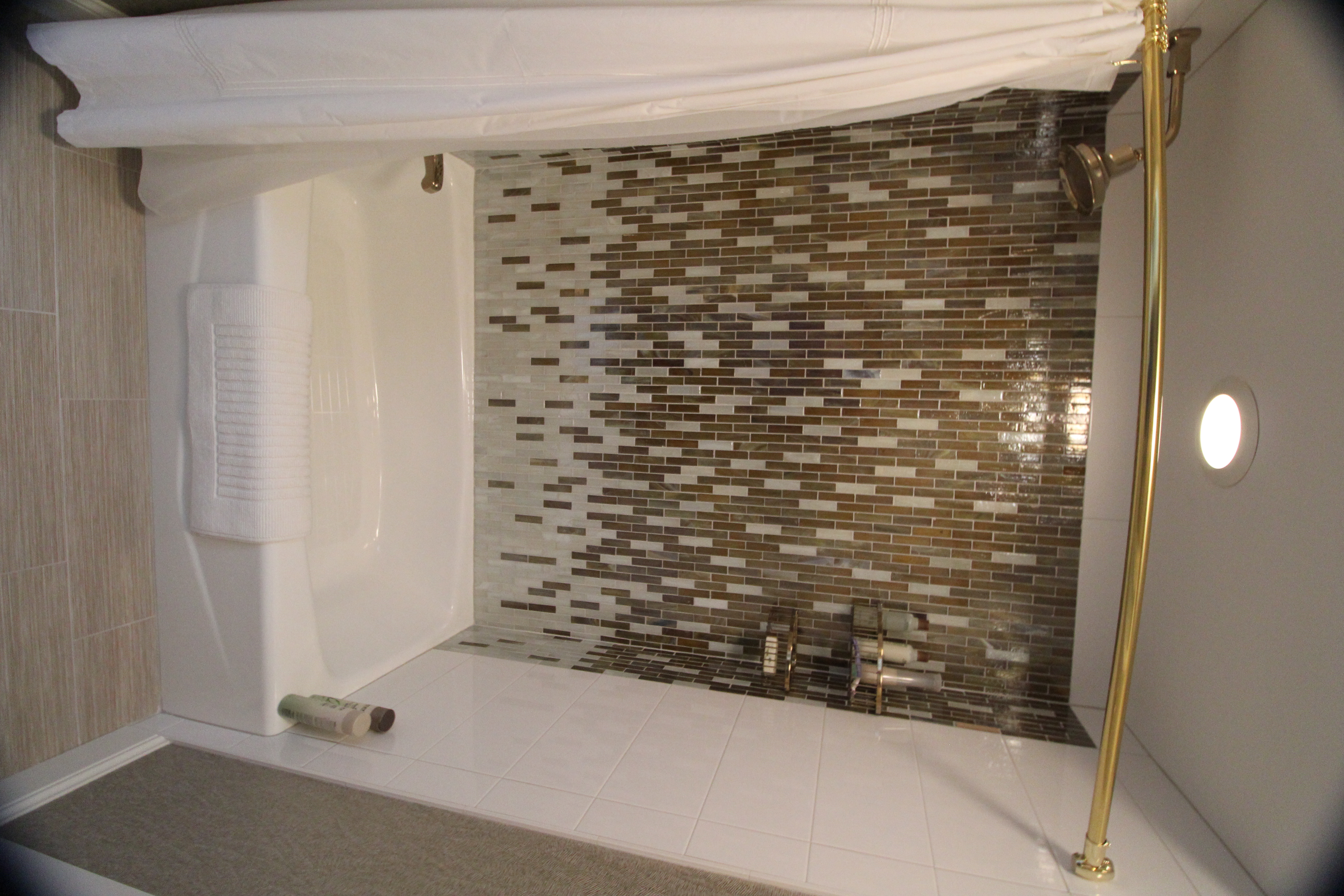 Custom bathroom vanity with stone countertop and integrated storage