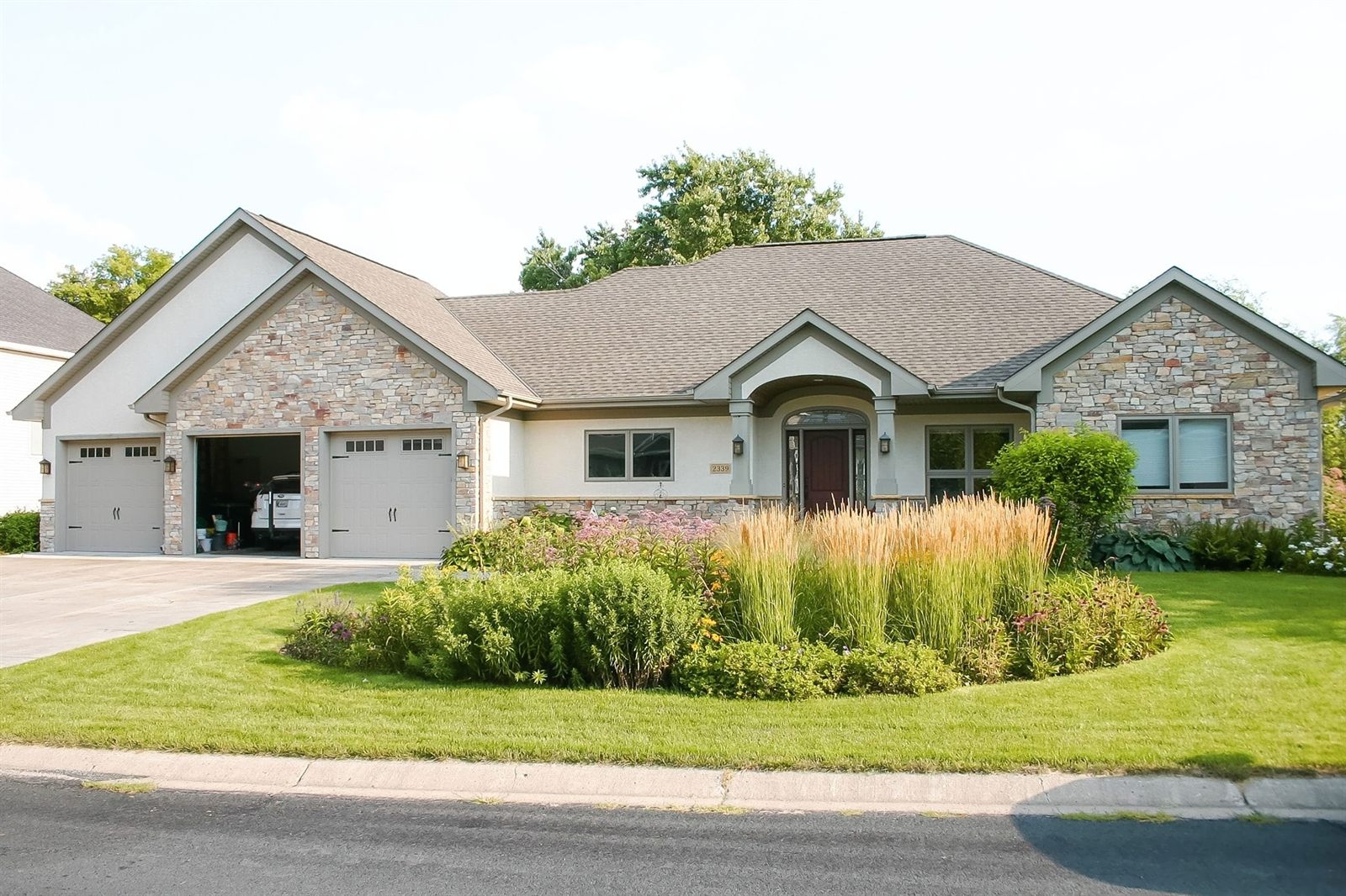 Whole-home exterior showcasing high-end residential craftsmanship