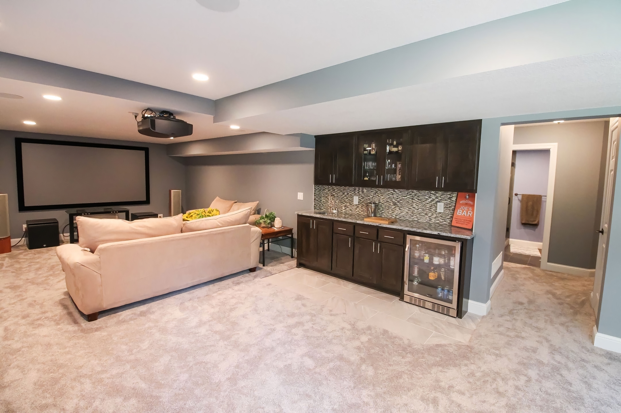 Finished basement and addition with refined detailing and comfortable gathering spaces